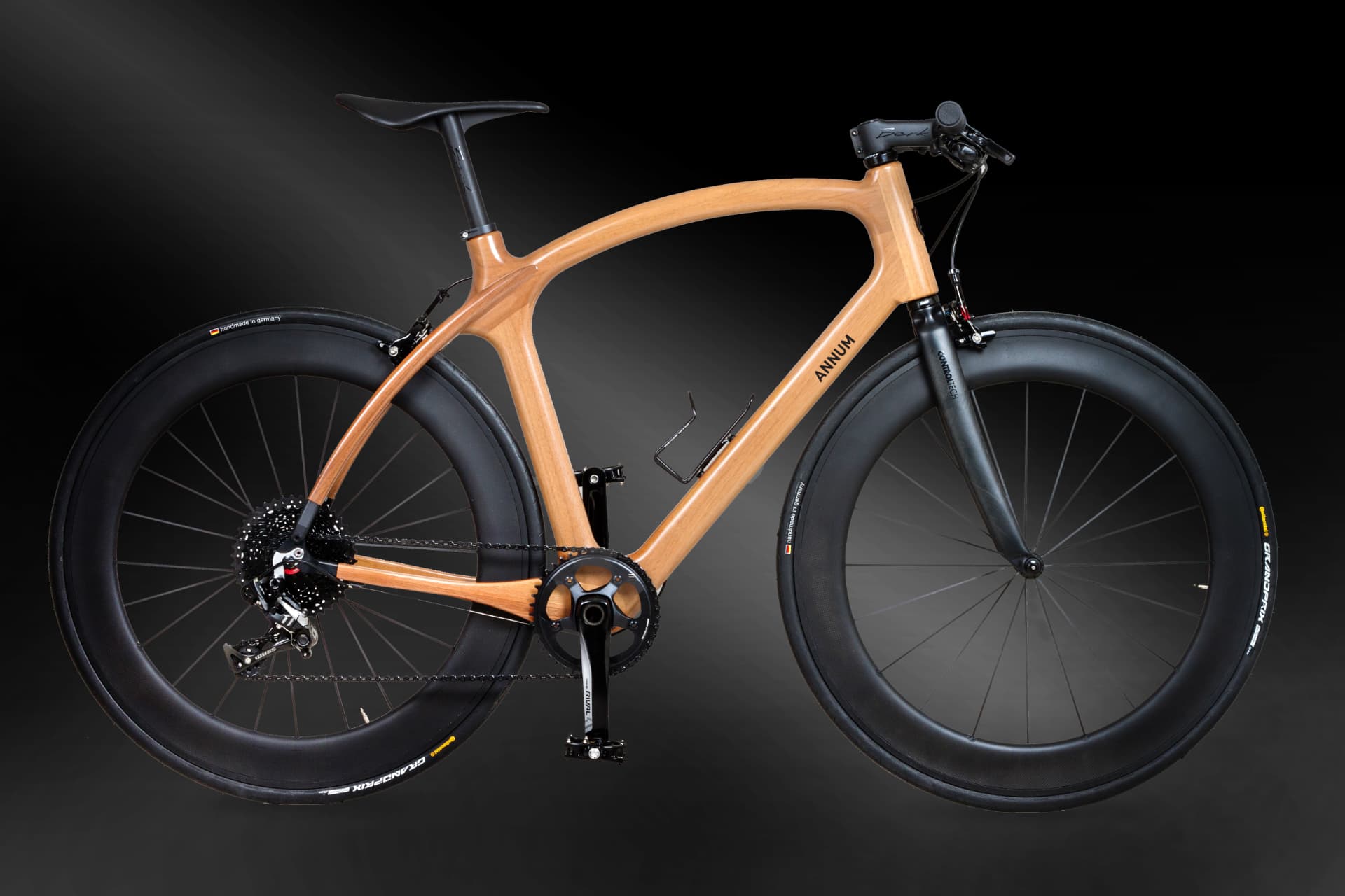 Annum wooden road bicycle photographed in profile