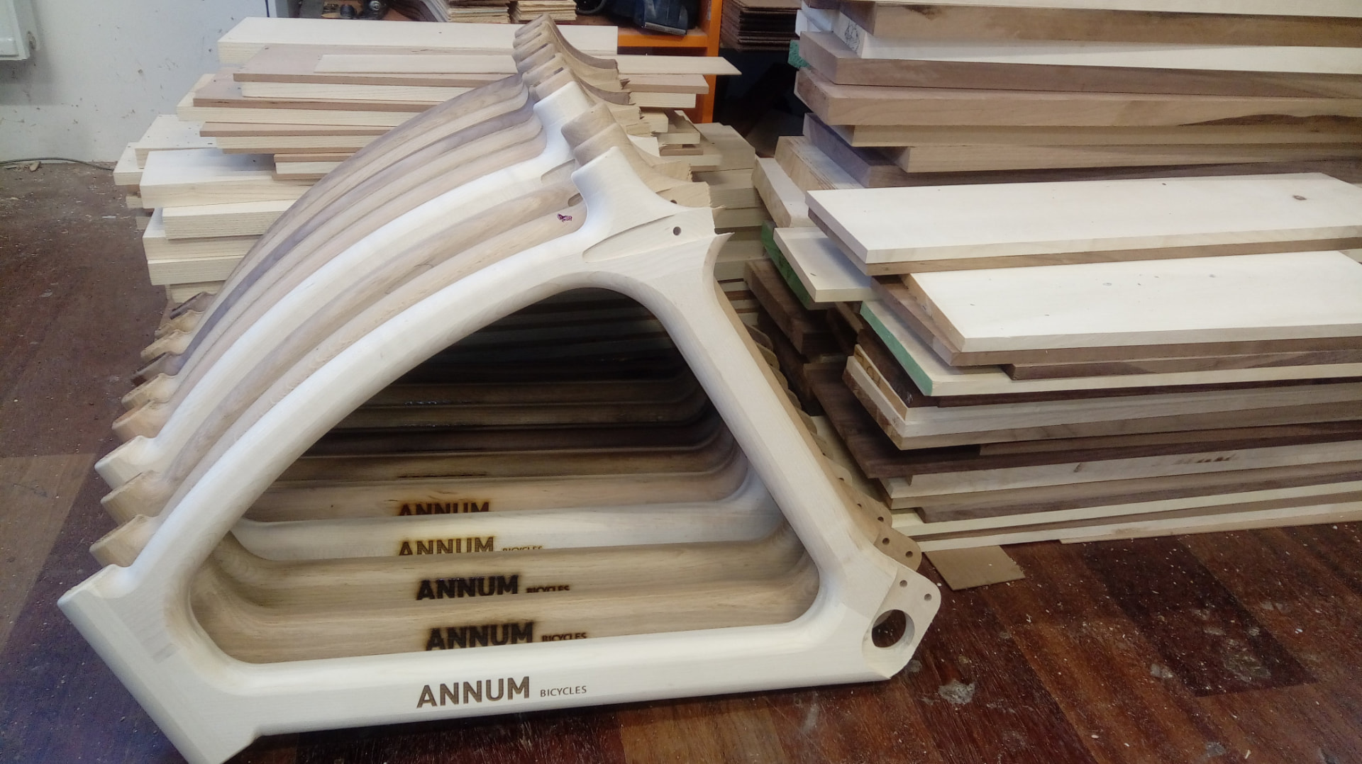 Handcrafted wooden Annum frames stacked in the workshop