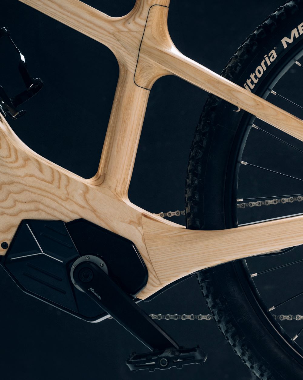 Drivetrain and rear frame detail of an Annum wooden bicycle